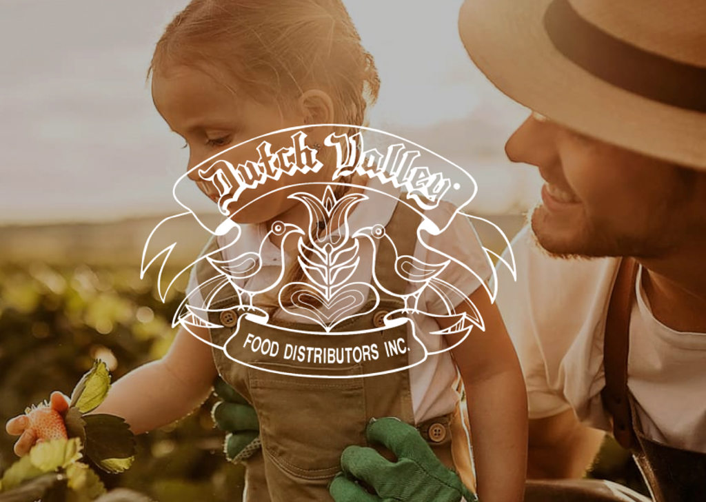 Image of a girl in a girl in a field picking a strawberry with the Dutch Valley Foods logo on top of the image