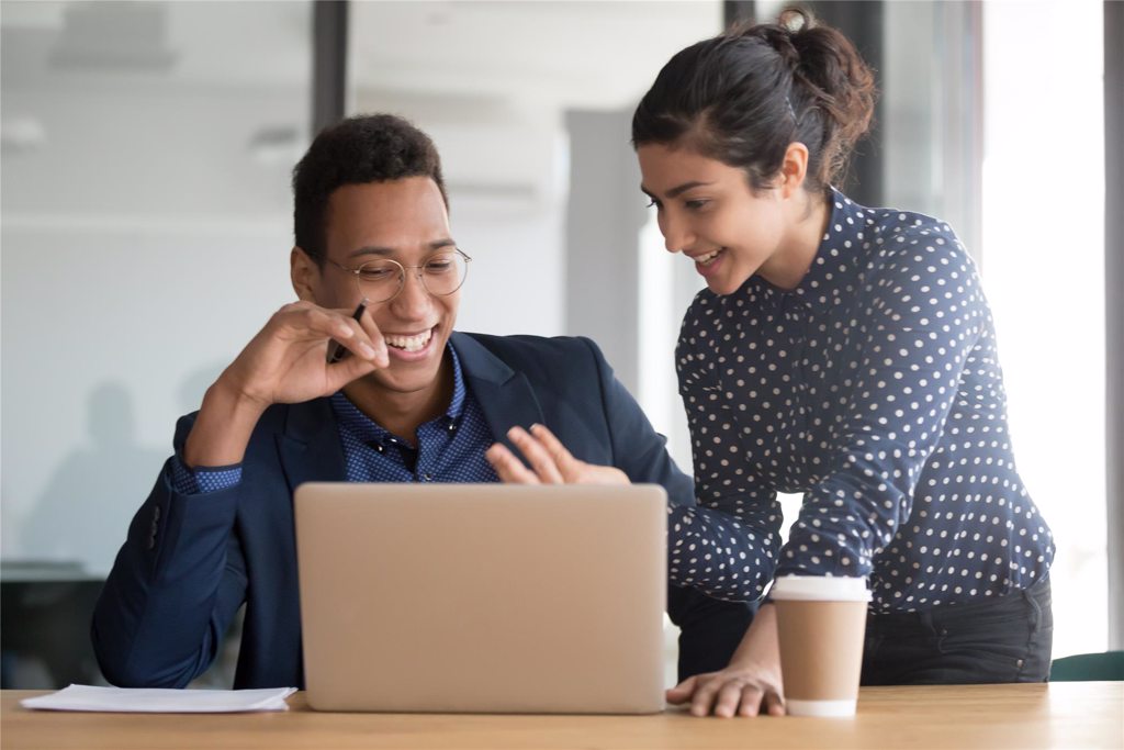 Man and woman working at office